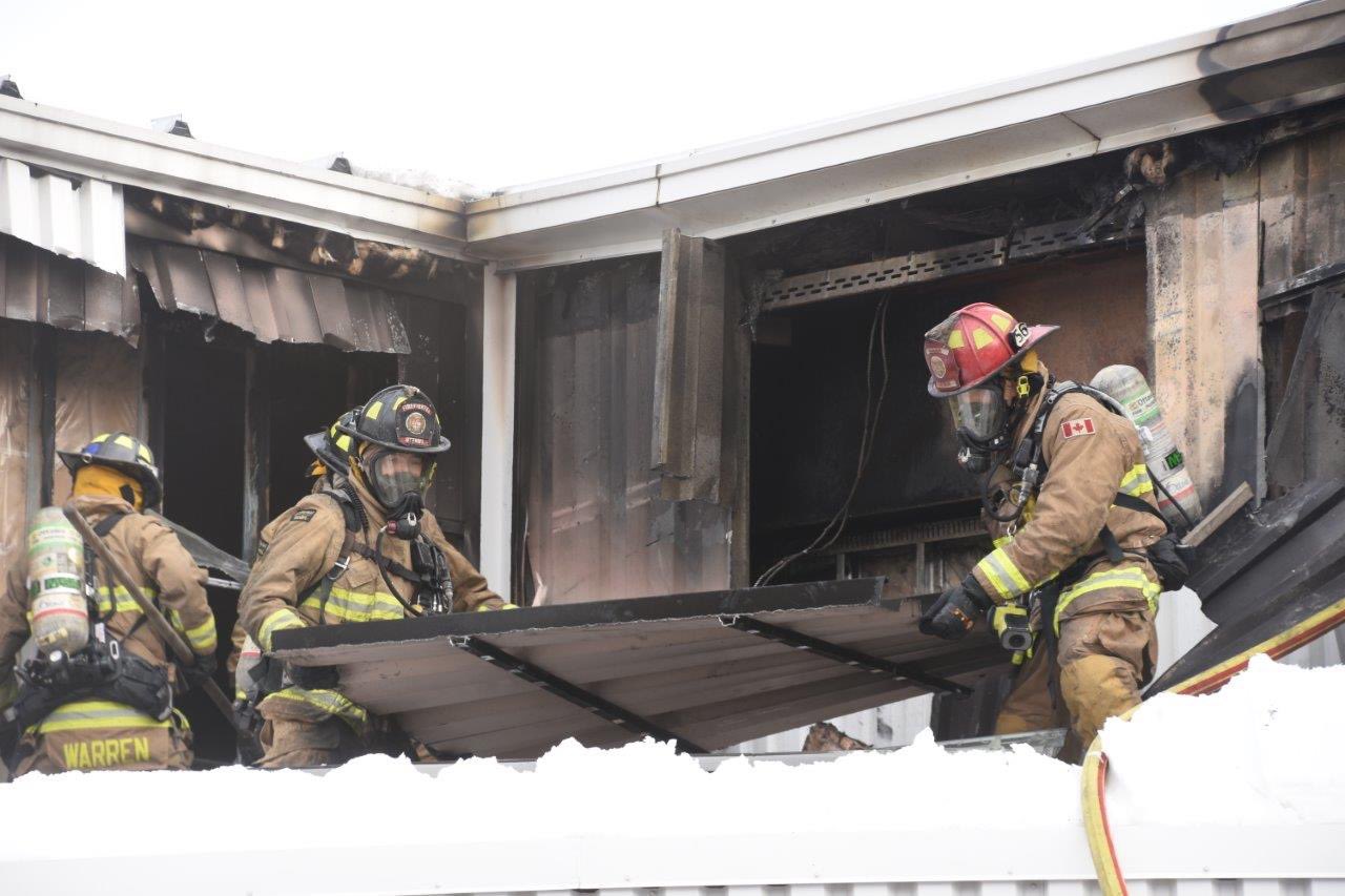 Firefighters saw holes in walls to battle blaze at former OAC building