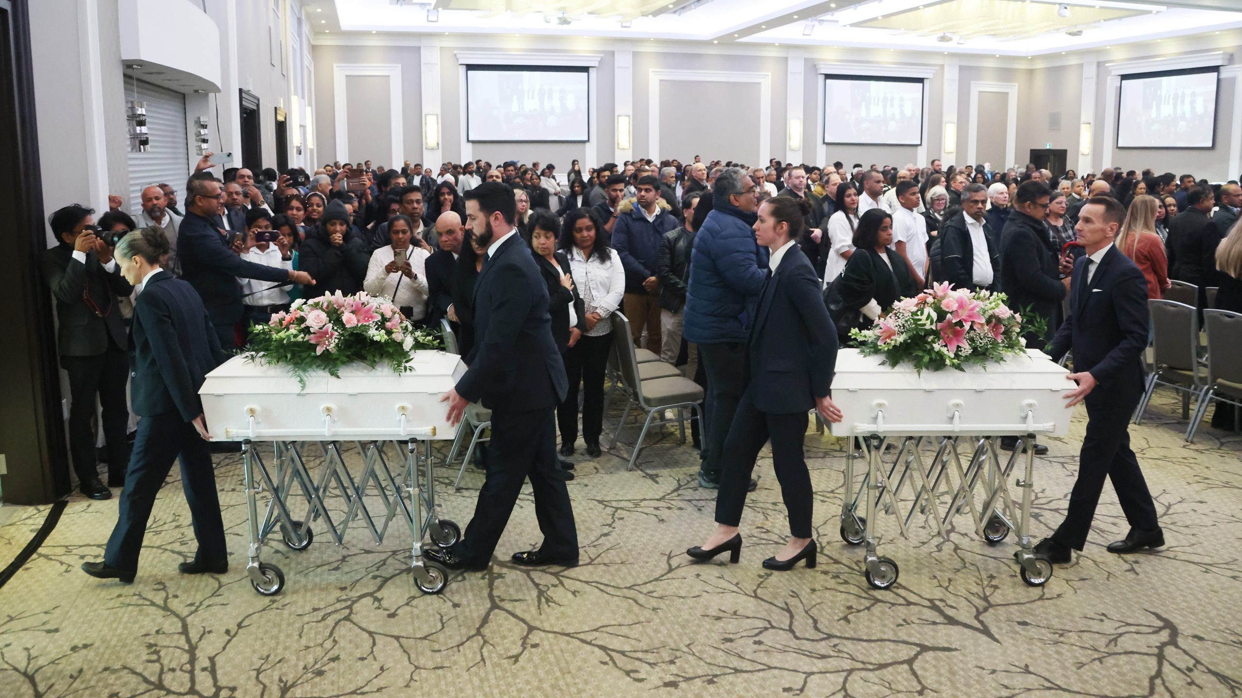 Grief, pleas for compassion at funeral for Sri Lankan family slain in
