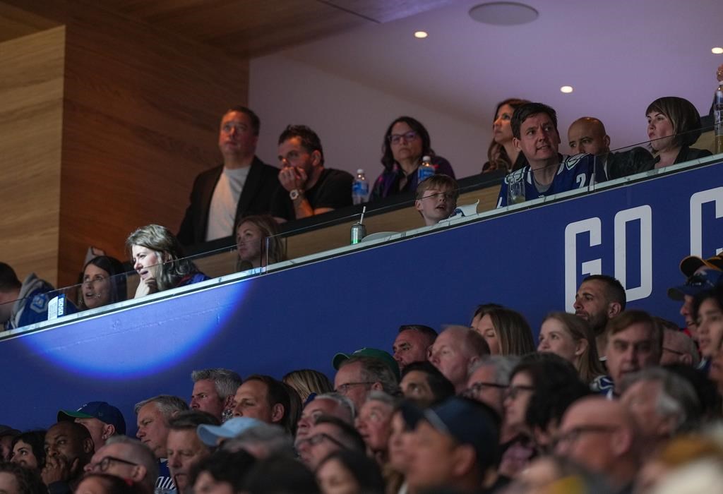 B.C.'s David Eby, Alberta's Danielle Smith watch Oilers-Canucks playoff game together