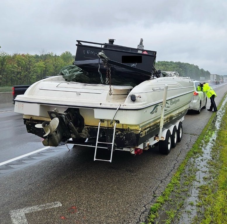 OPP charge driver for towing boat full of unsecure items on Hwy. 416