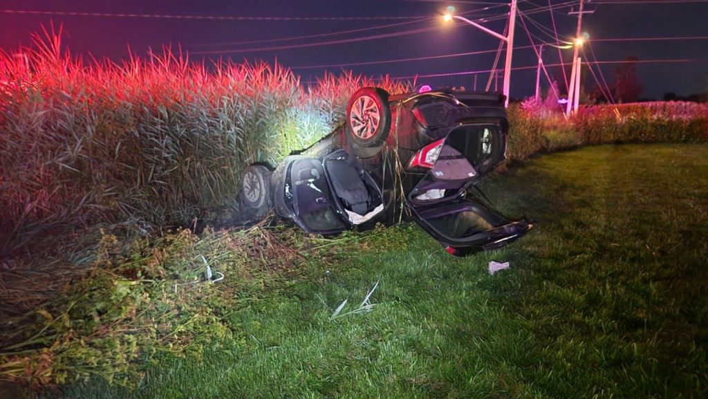 A vehicle upside and in a ditch near Vars. (Ottawa fire)