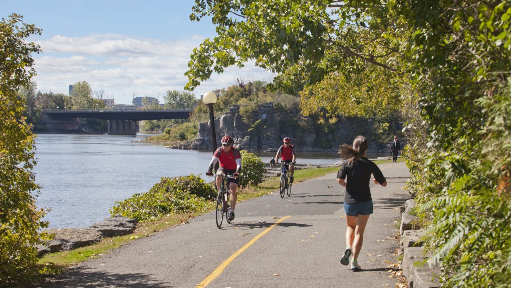 Photo by NCC. people riding on bikes, people bike riding