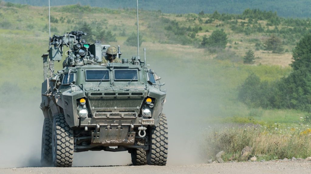 Canadian Army vehicles traveling through Southern and Central Ontario