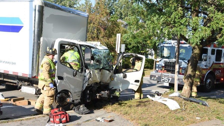 Firefighters rescue two people following single-vehicle crash into tree