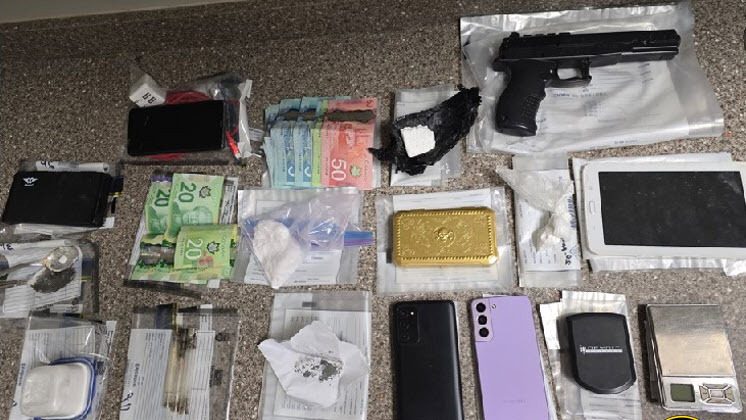 Replica handgun, drugs and other tools for trafficking from search warrants in Arnprior. (OPP)