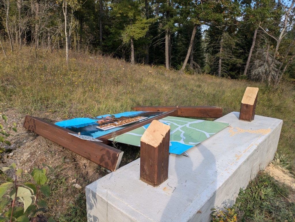 Business sign cut down with chainsaw in Madawaska Township