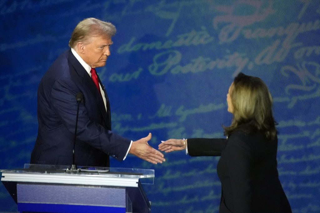 Debate opens with tense disputes between Trump and Harris over economy and abortion