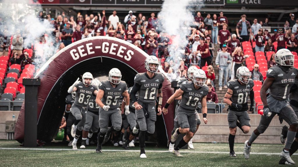 UOttawa football players entering the stadium for the annual Panda Game. (UOttawa photo)