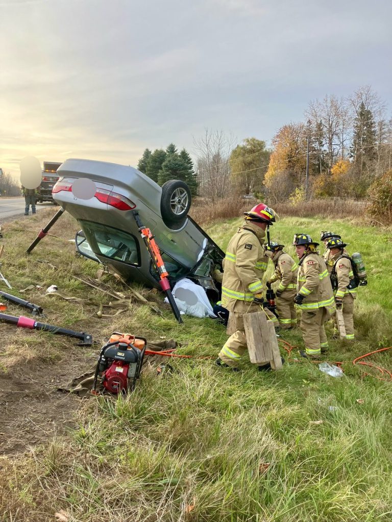 Driver rescued from vehicle after rollover on Highway 416