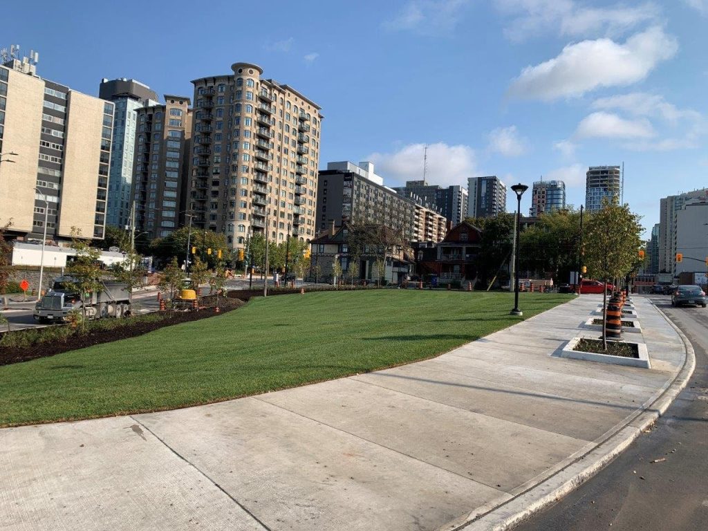 Additionally, a new sidewalk and renewed landscaping has been added on the new triangle island at Albert Street, Slater Street and Bronson Avenue. Photo by City of Ottawa.