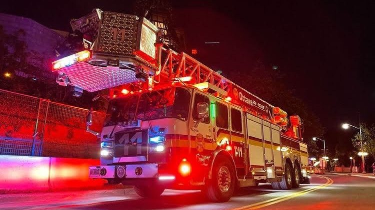 Firefighters knock down a townhouse garage fire