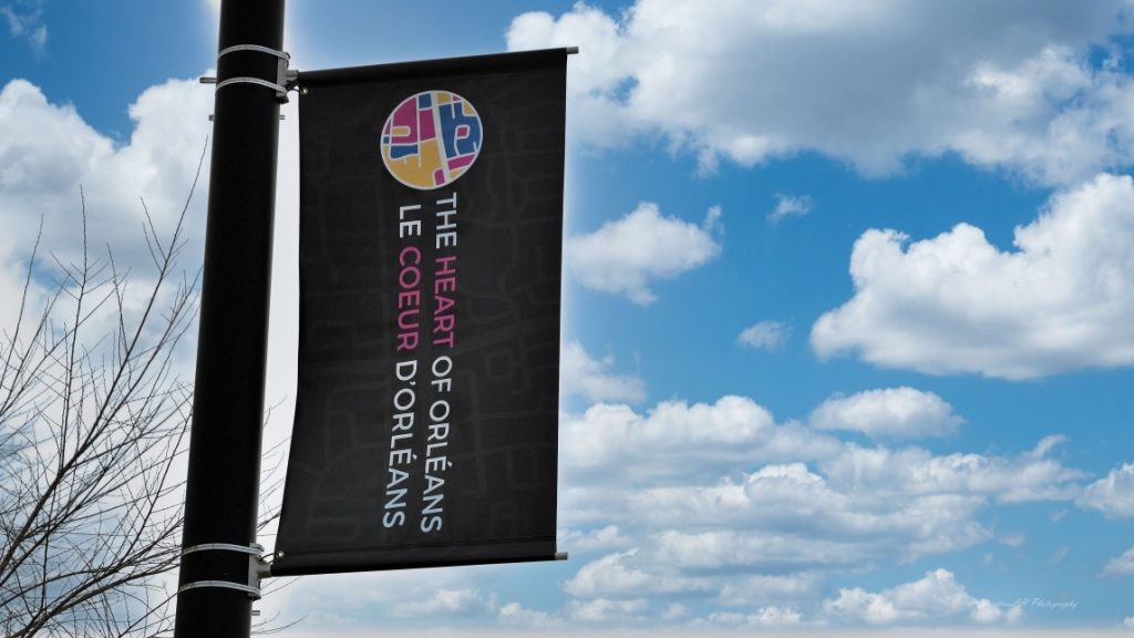 Banner hanging in the Heart of Orléans. Photo by City of Ottawa.