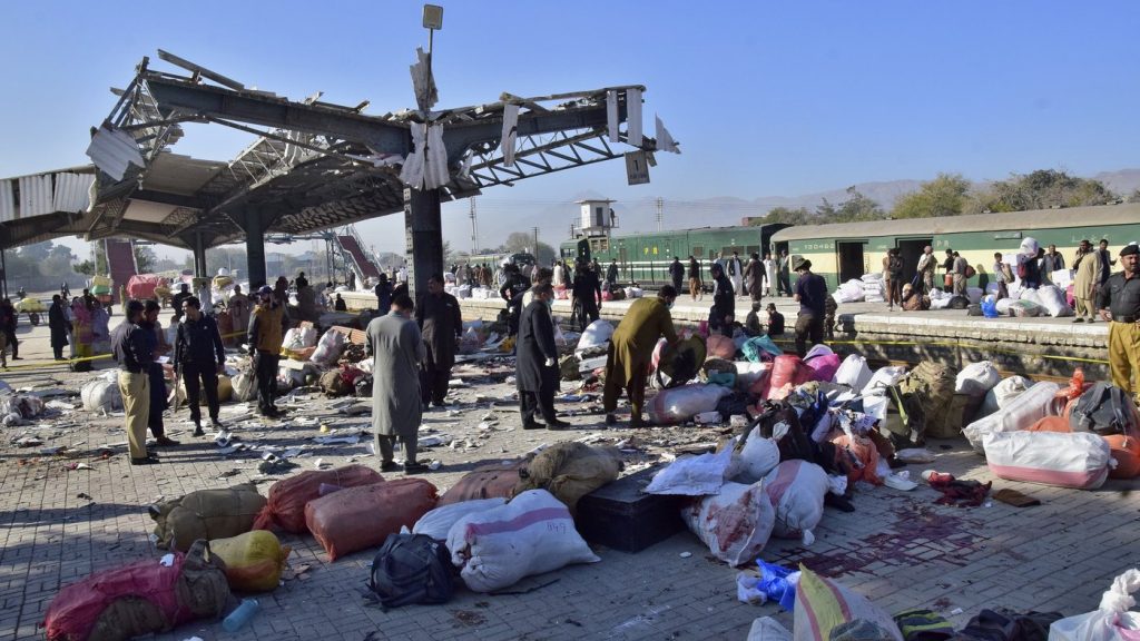 A powerful suicide bombing at a rail station in southwestern Pakistan kills at least 26