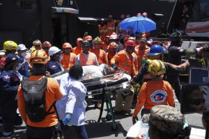 Roof collapse at Dominican club kills at least 113 as officials scramble to identify victims