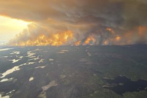 Rain not forecasted as crews battle wildfire burning near Flin Flon, Manitoba.