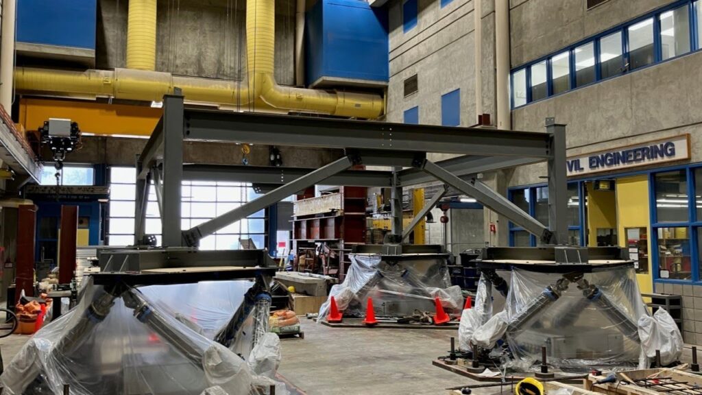 A building structure mounted on Carleton University's "shaking table" for a test. (Carleton U)