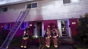 Fire crews tackling a blaze in Vanier South early Wednesday morning. (Jean Lalonde/OFS)