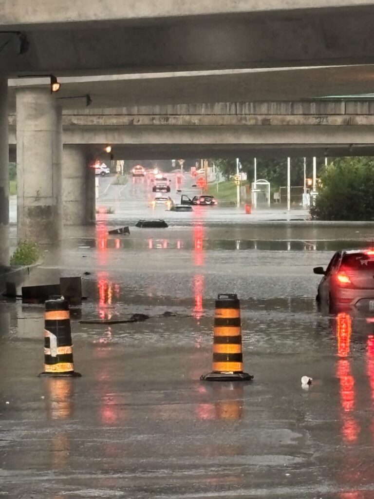 The rain fell fast and intensely on Canada Day, forcing those on the roadways to pause before the dangerous conditions passed. (Hydro Ottawa)